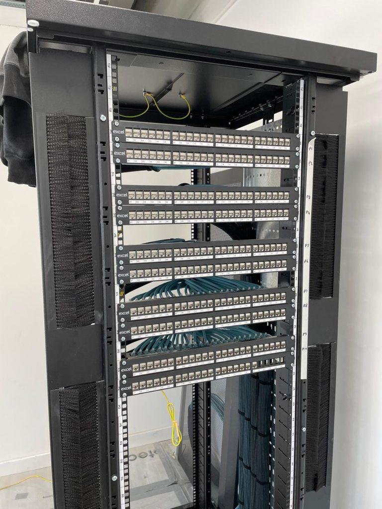 Excel patch panels installed in a new comms cabinet ready for termination