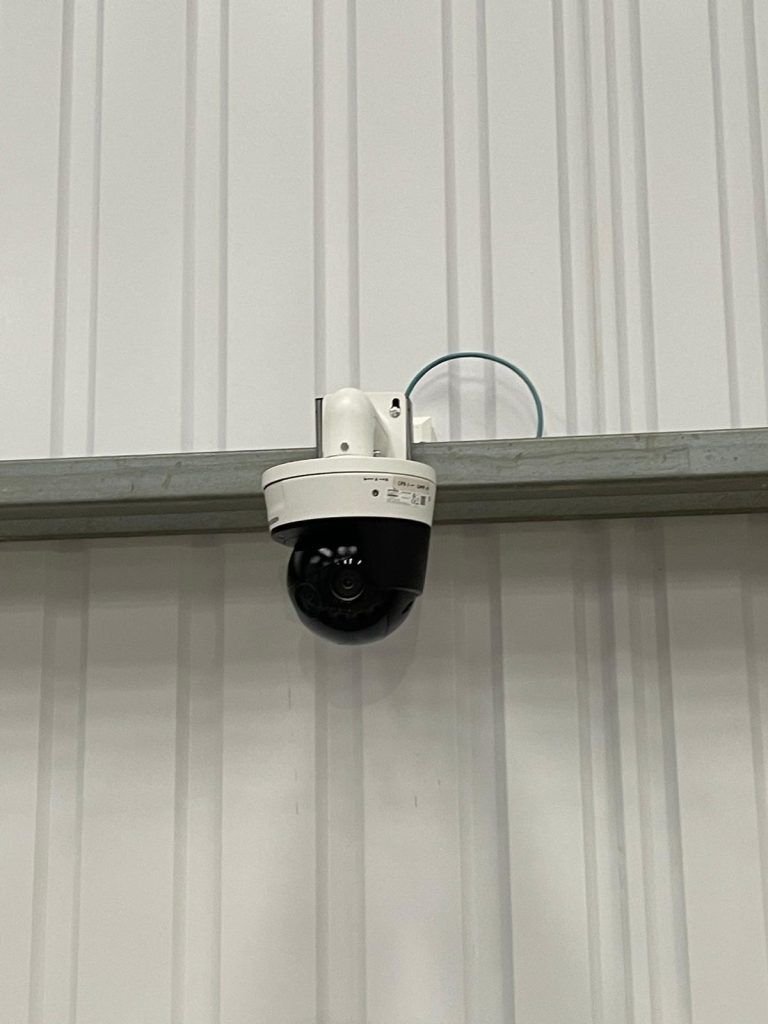 Dome CCTV camera installed on a warehouse wall by UltraNet Ltd
